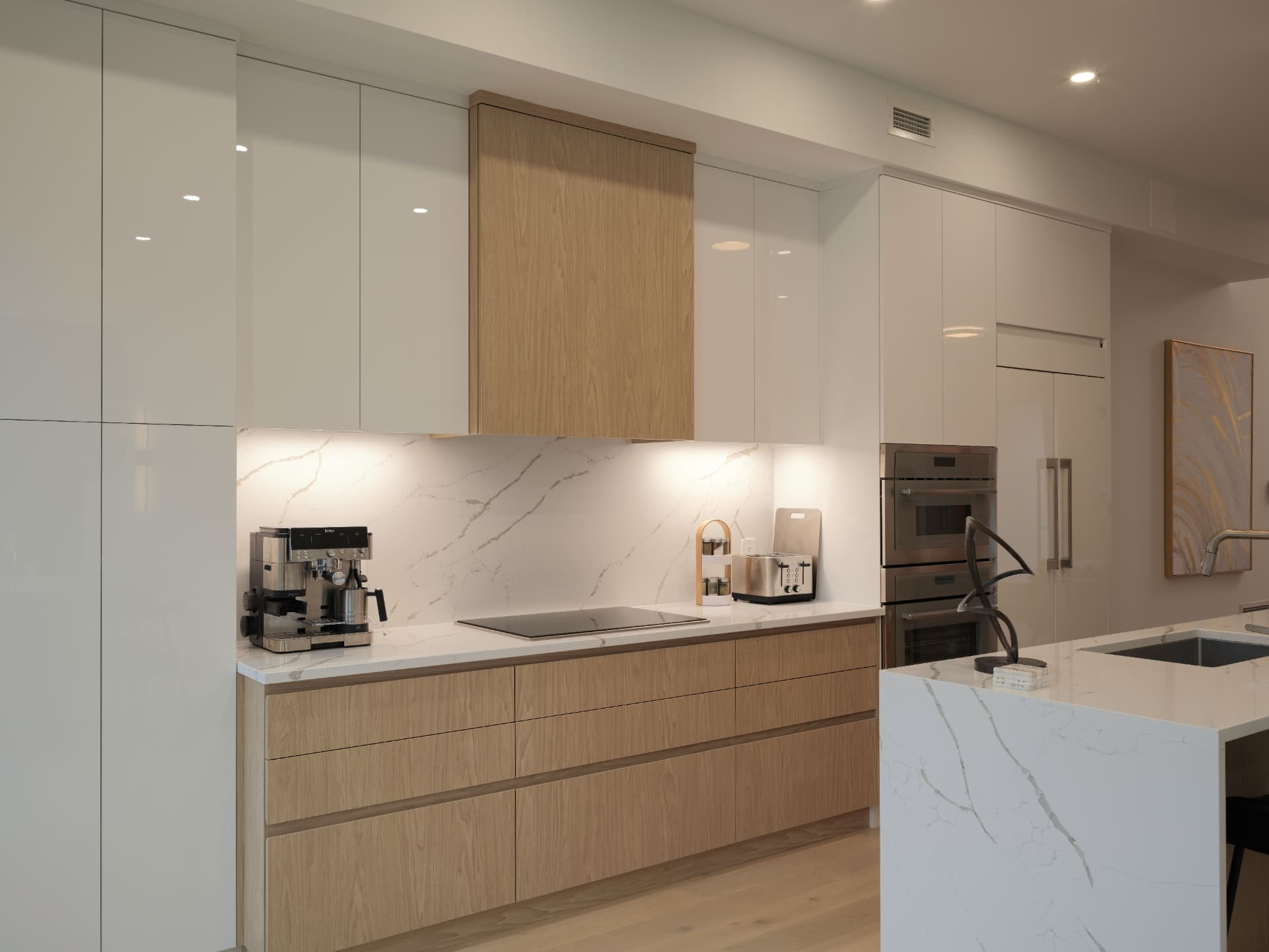 Notting Hill Apartment — white oak drawer bank with book-matched marble splashback, London W11