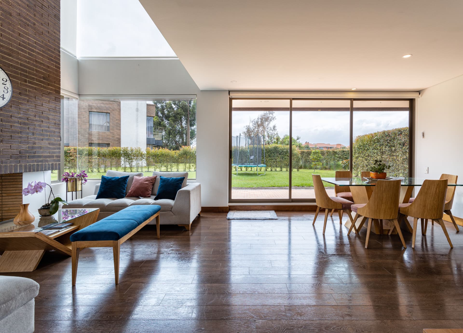 Open plan living and dining room with sliding glazing onto the garden