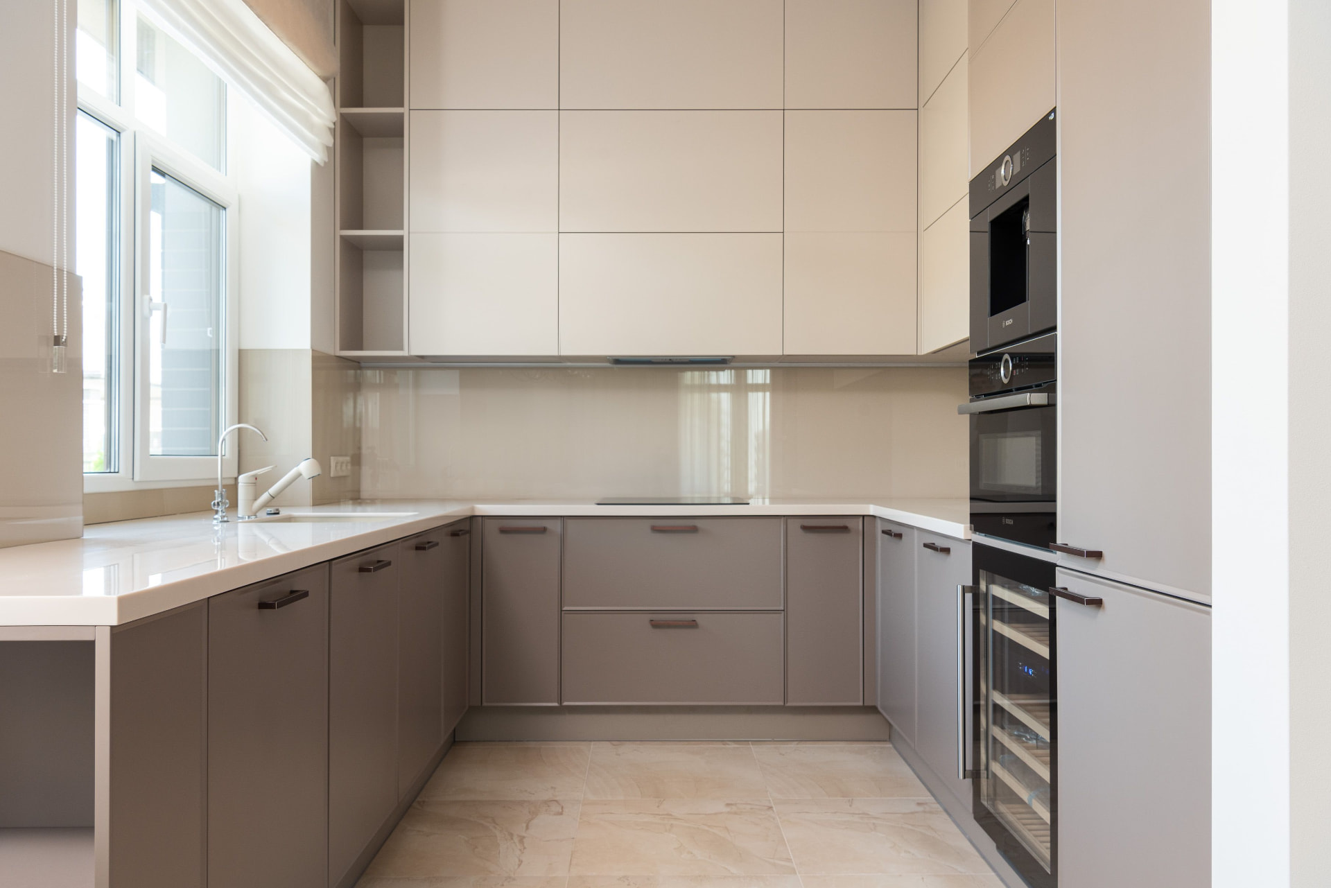 Kensington Mews House — handleless matt lacquer kitchen in taupe and cream, London W8