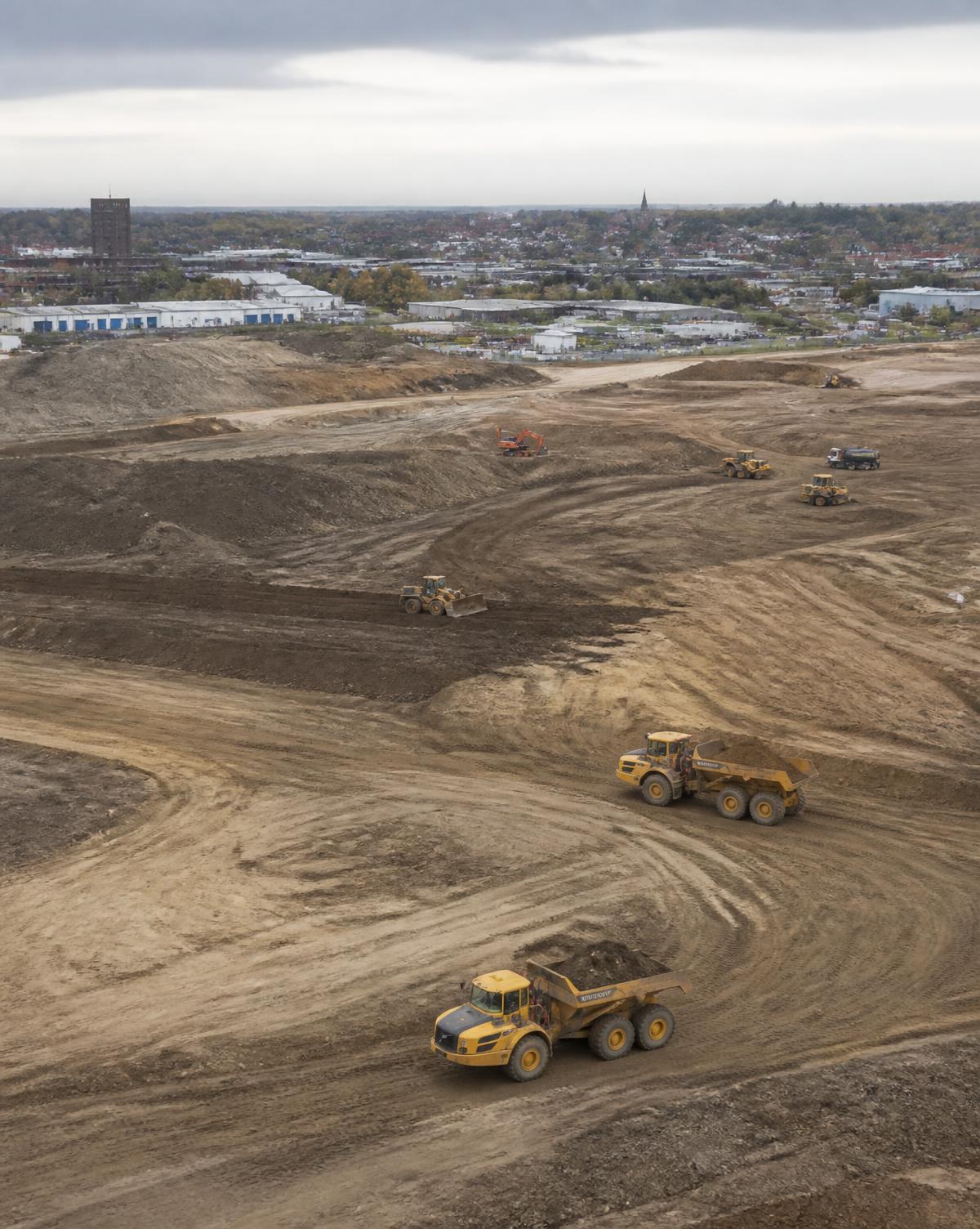 Ground reclamation earthworks levelling the brownfield site